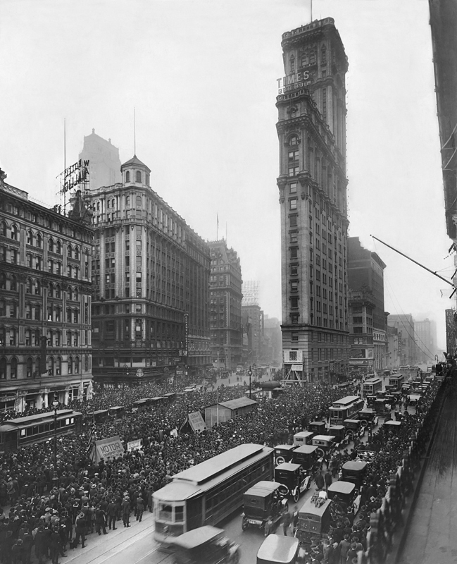 People gather outside The New York Times building in Times Square to get World Series results from a remote scoreboard in October, 1919.JPG
