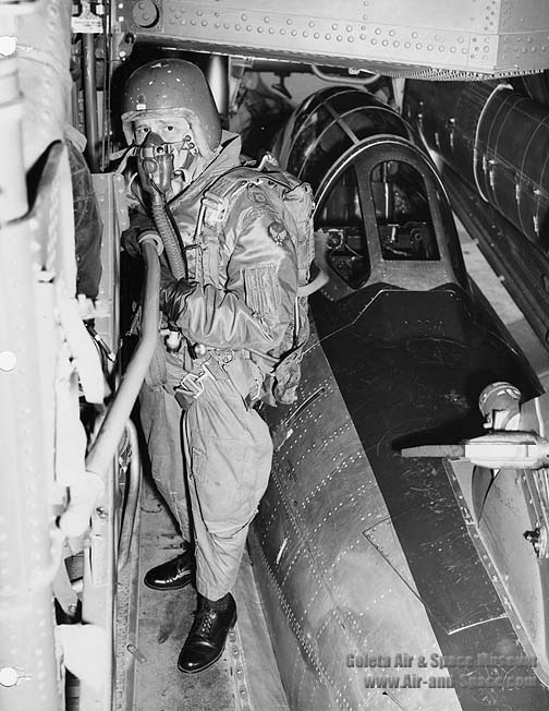 Major Clyde Good working his way from the cockpit of the YRF-84F to the camera compartment.jpg