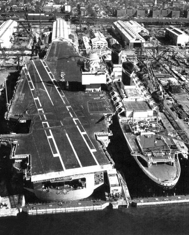 USS Enterprise (CVN-65) and SS United States in dry dock at Newport News, Virginia in November, 1964.jpg