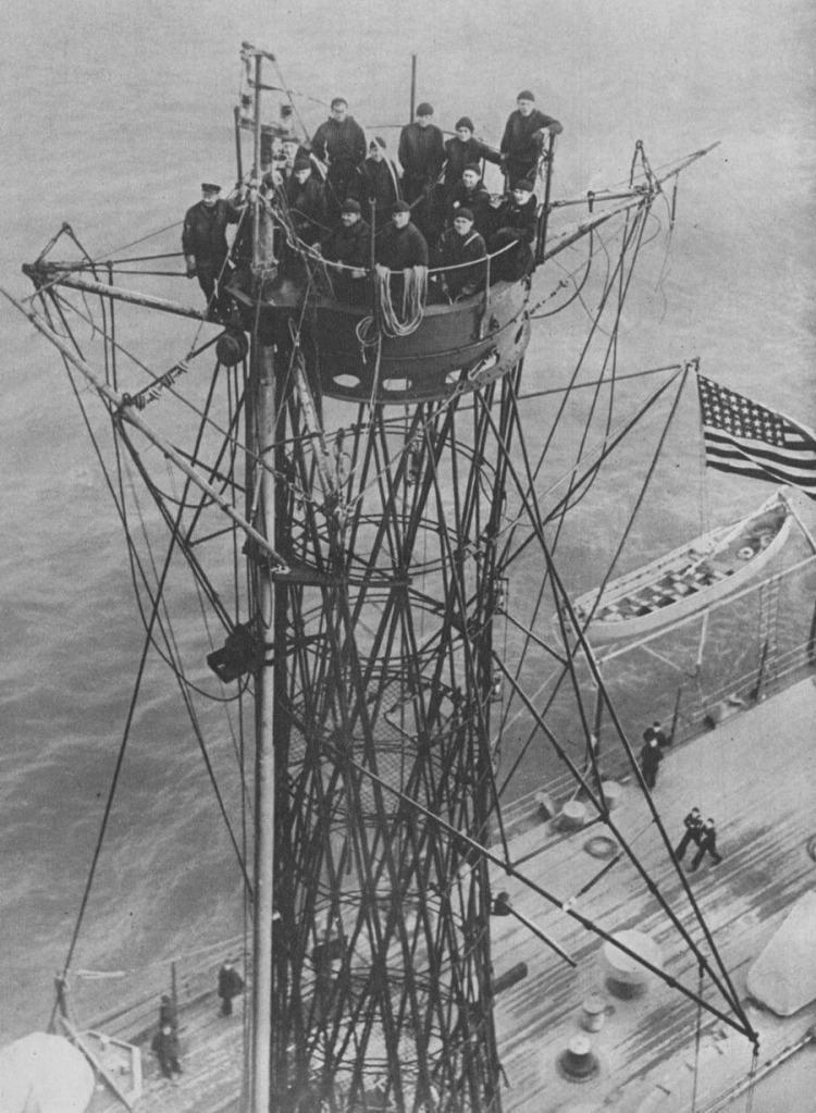 On the mast top of the US battleship.jpg