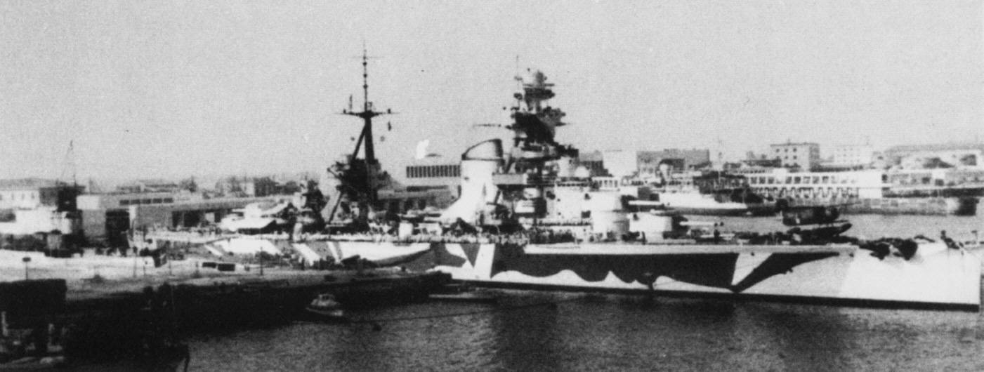 Trento in war camouflage at Messina.jpg