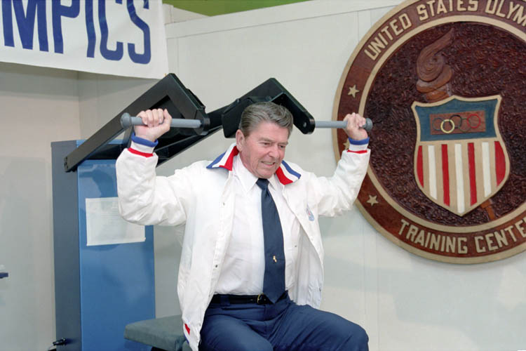 President Reagan lifting weights on computerized strength-measurement machine at United States Olympic Training Facility, Colorado Springs, Colorado. May 29, 1984.jpg