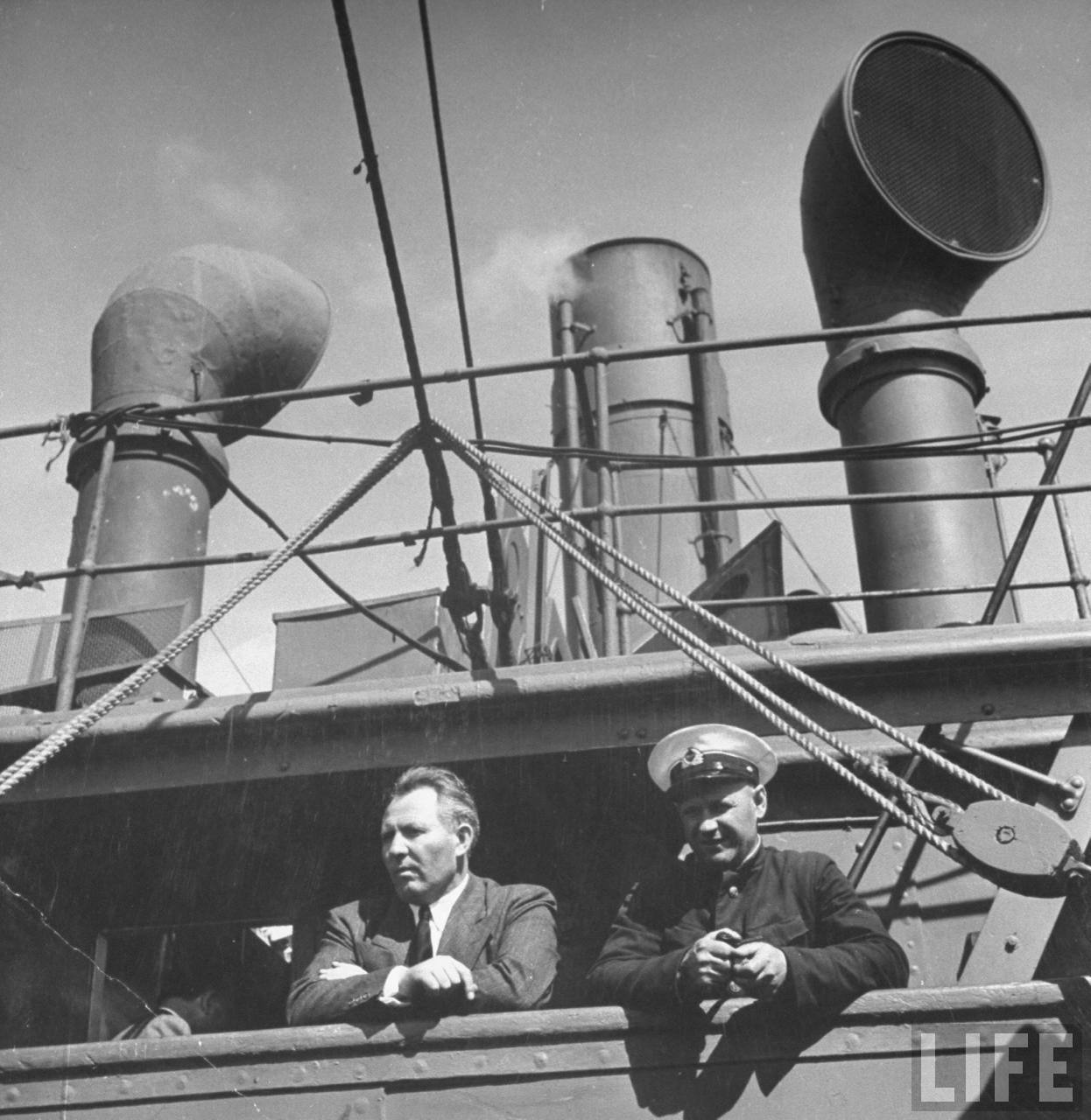 Captain standing on deck of Russian war ship.jpg