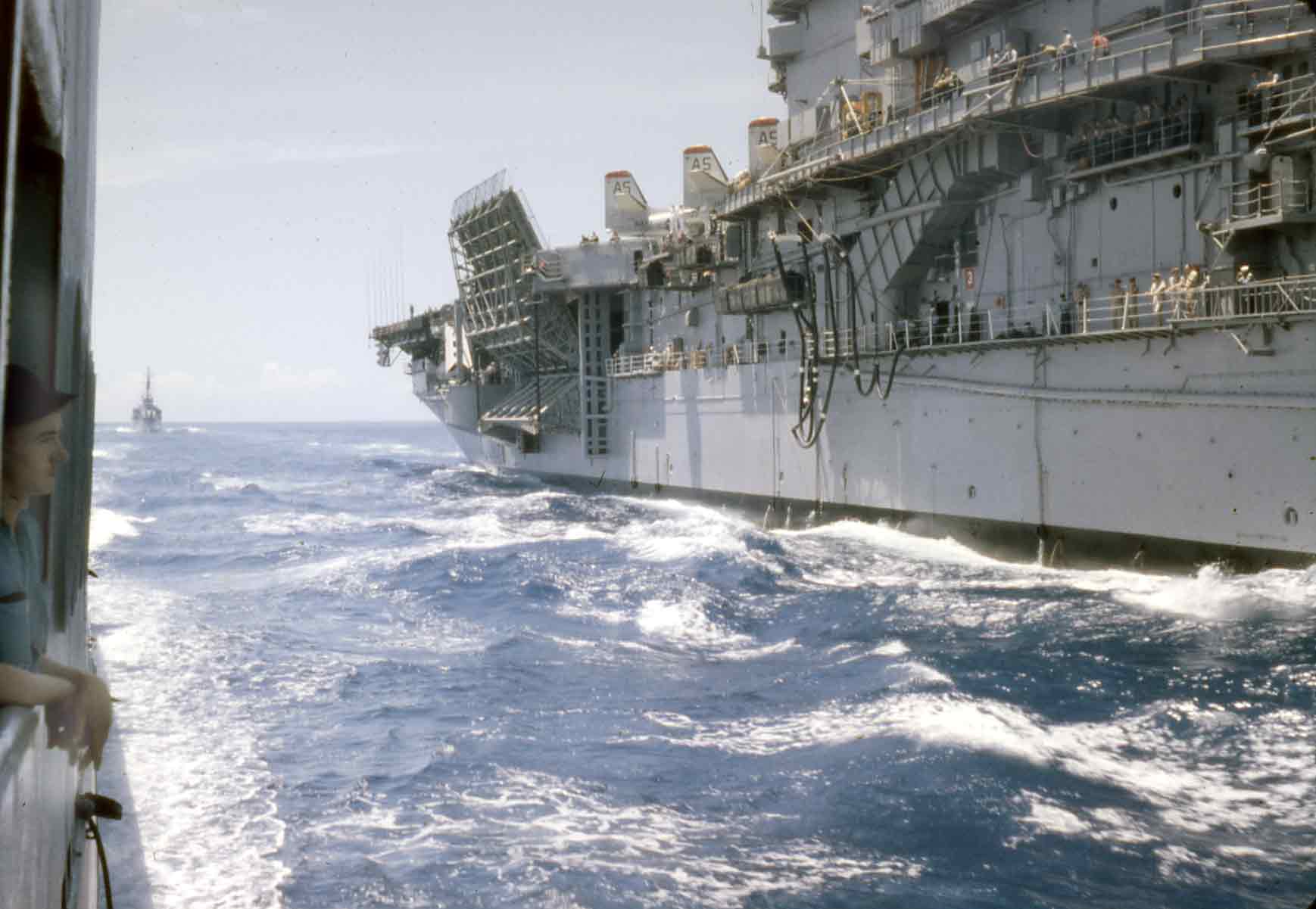 USS Holder (DDE-819) approaching USS Wasp (CV-18) to refuel, 12 June 1961 - stern - Donald R. Beal.jpg